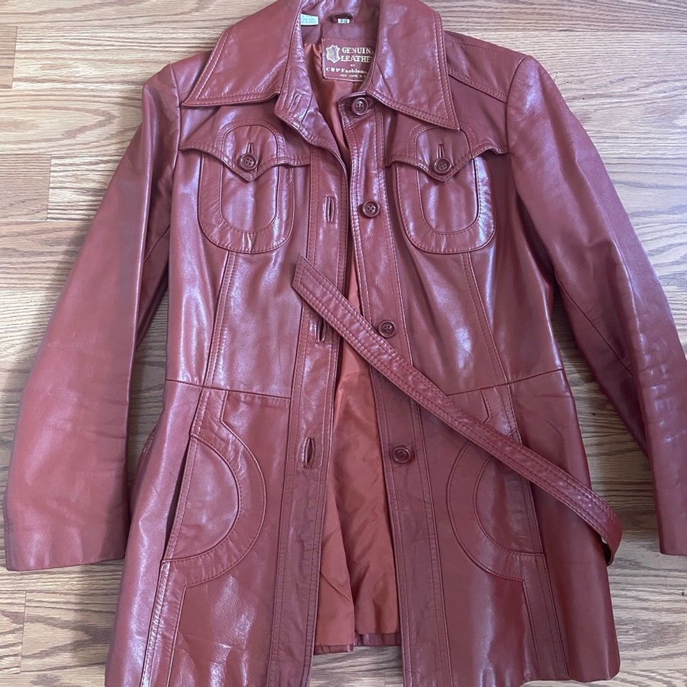 Genuine leather copper red trench jacket.